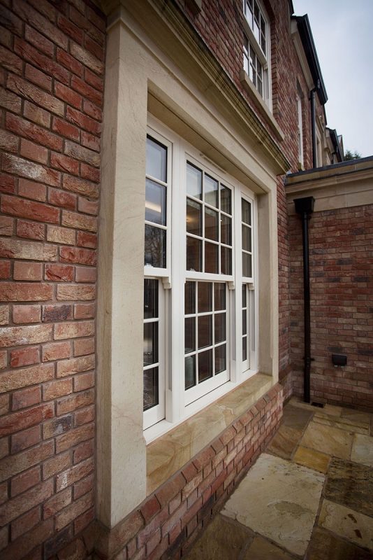 Large replacement windows Stourbridge home with brick paving