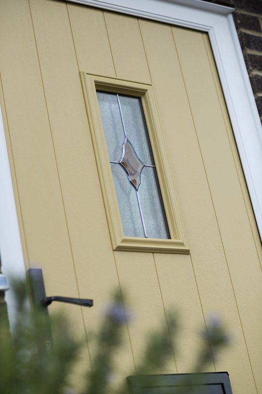 Close up image of a composite door with feature glass panel