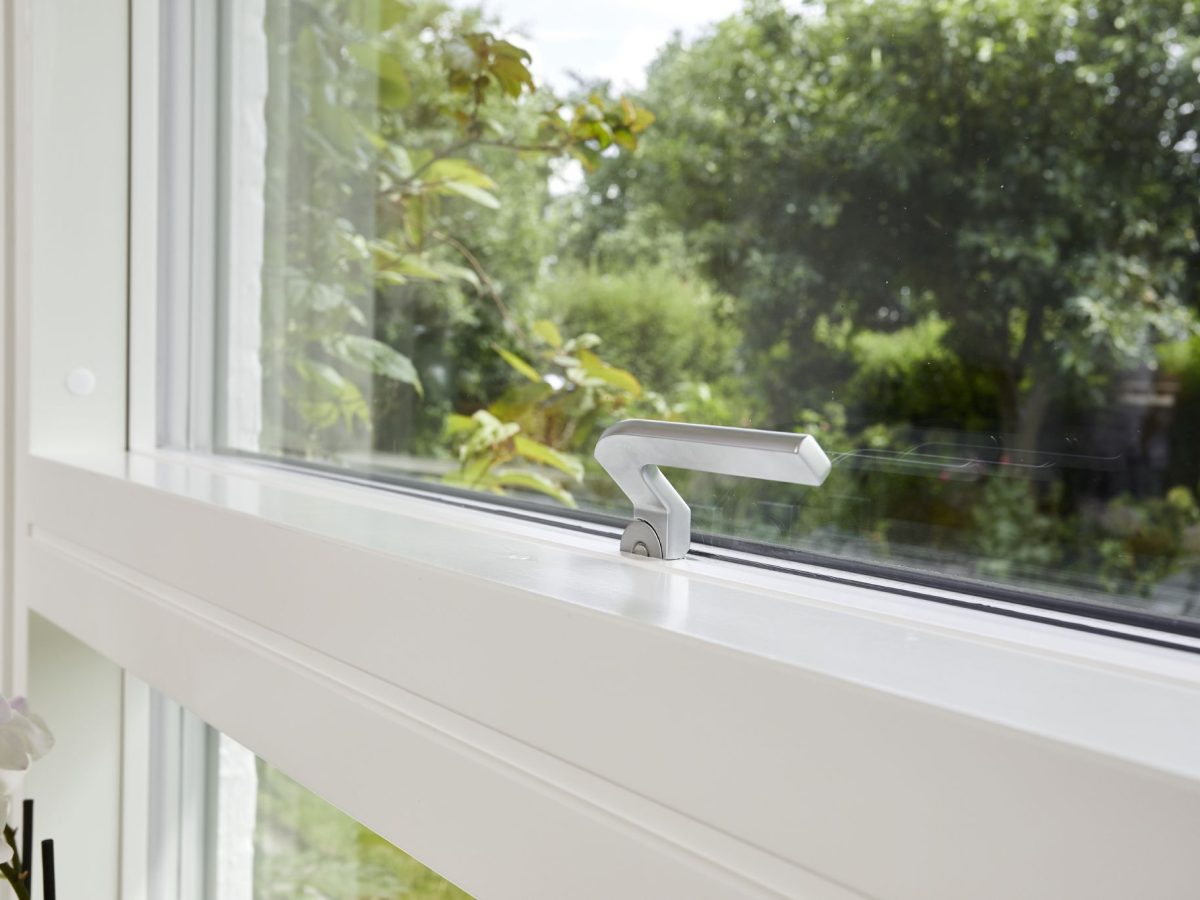 close up image of velfac 200 window with handle hardware