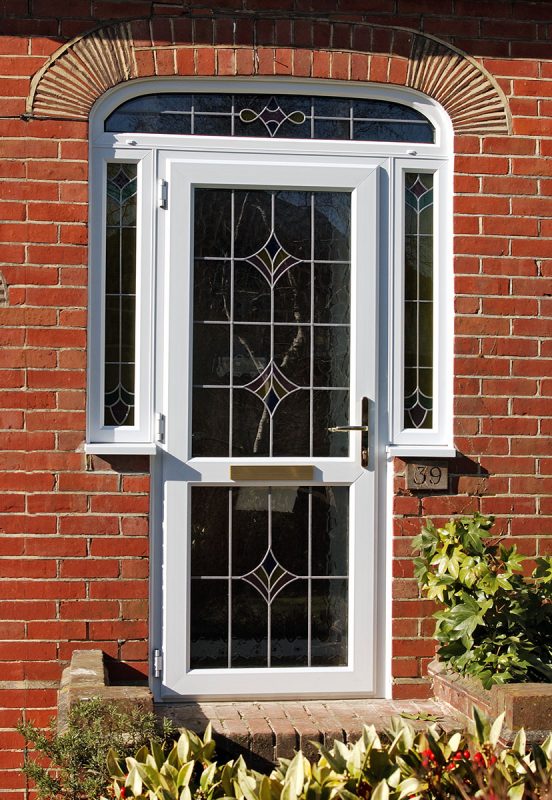 door with decorative glass installed in top and bottom panel